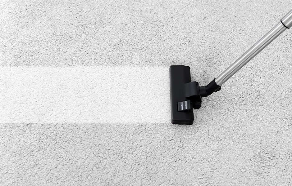 Vacuuming carpet